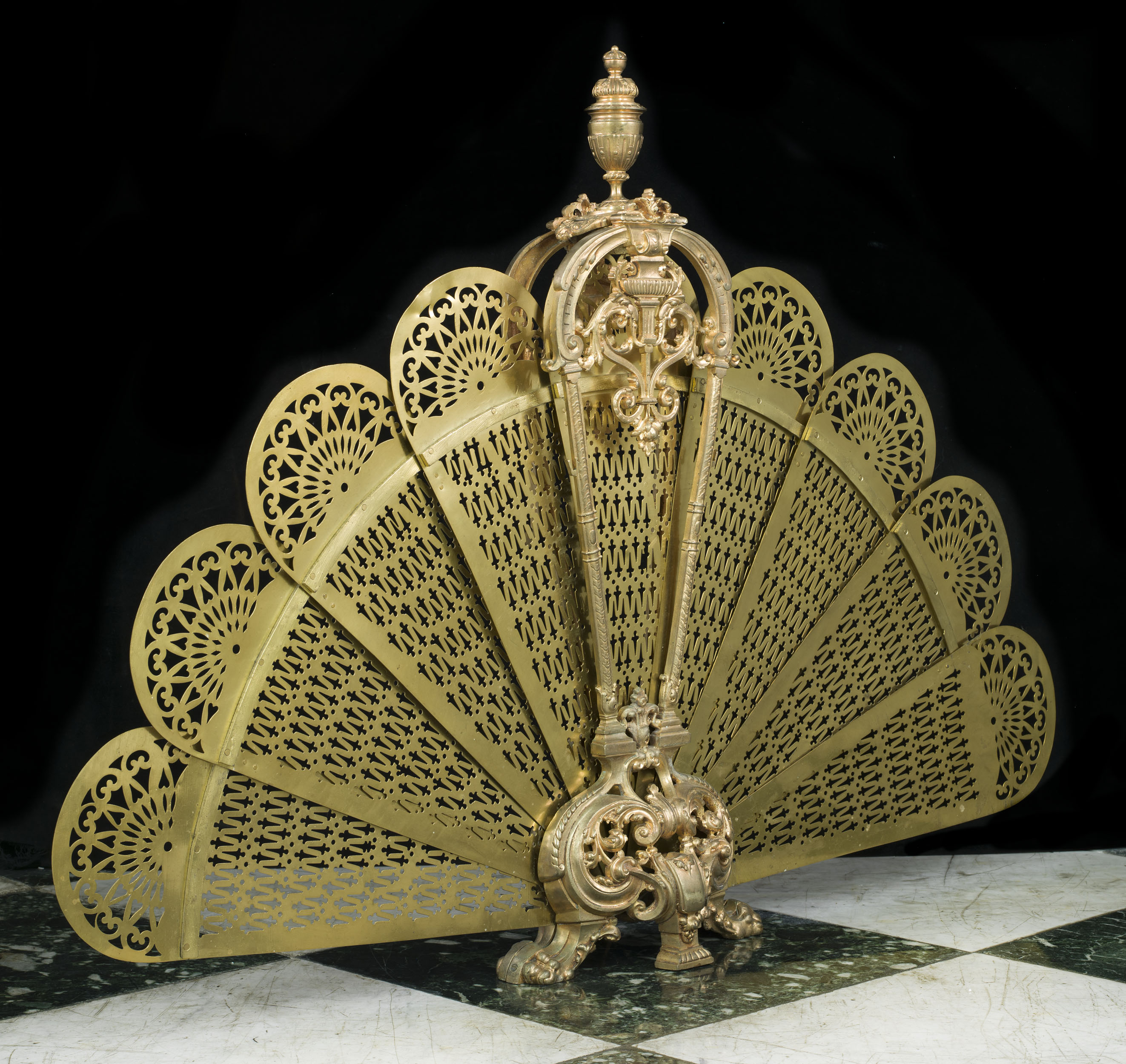  A cut brass Rococo style peacock fan fire guard   