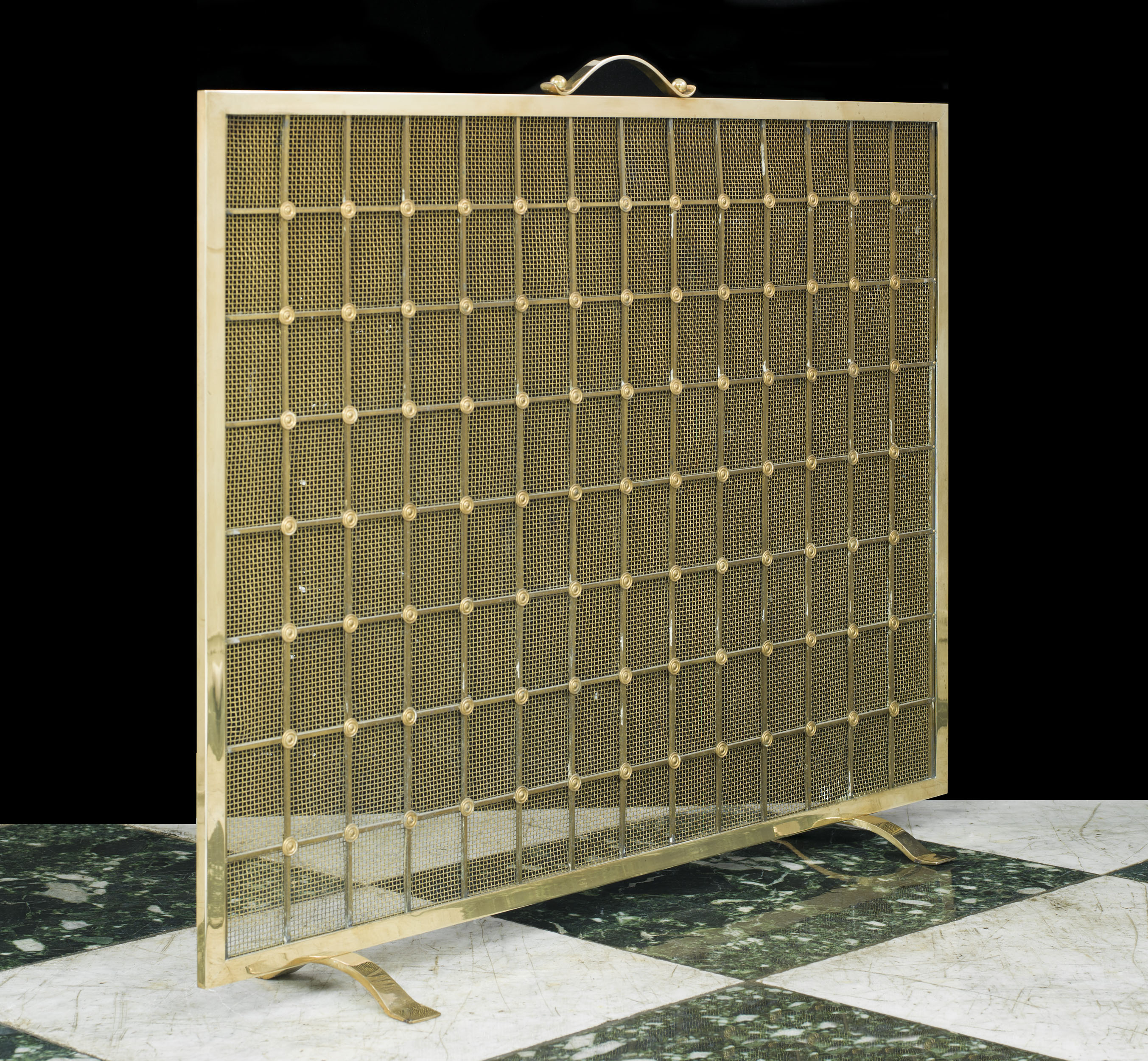  A smart and large 20th century brass and cut mesh fire guard   