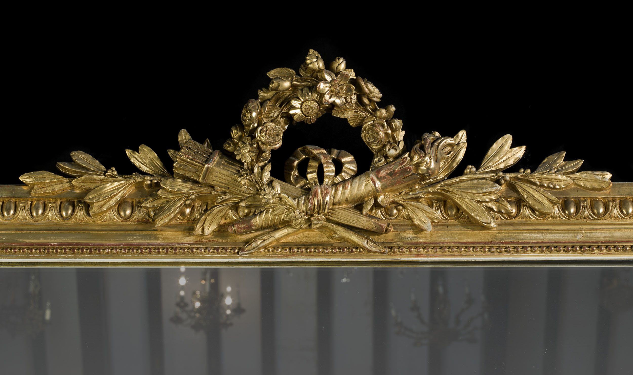 A Classical Style Gilded Overmantel Mirror