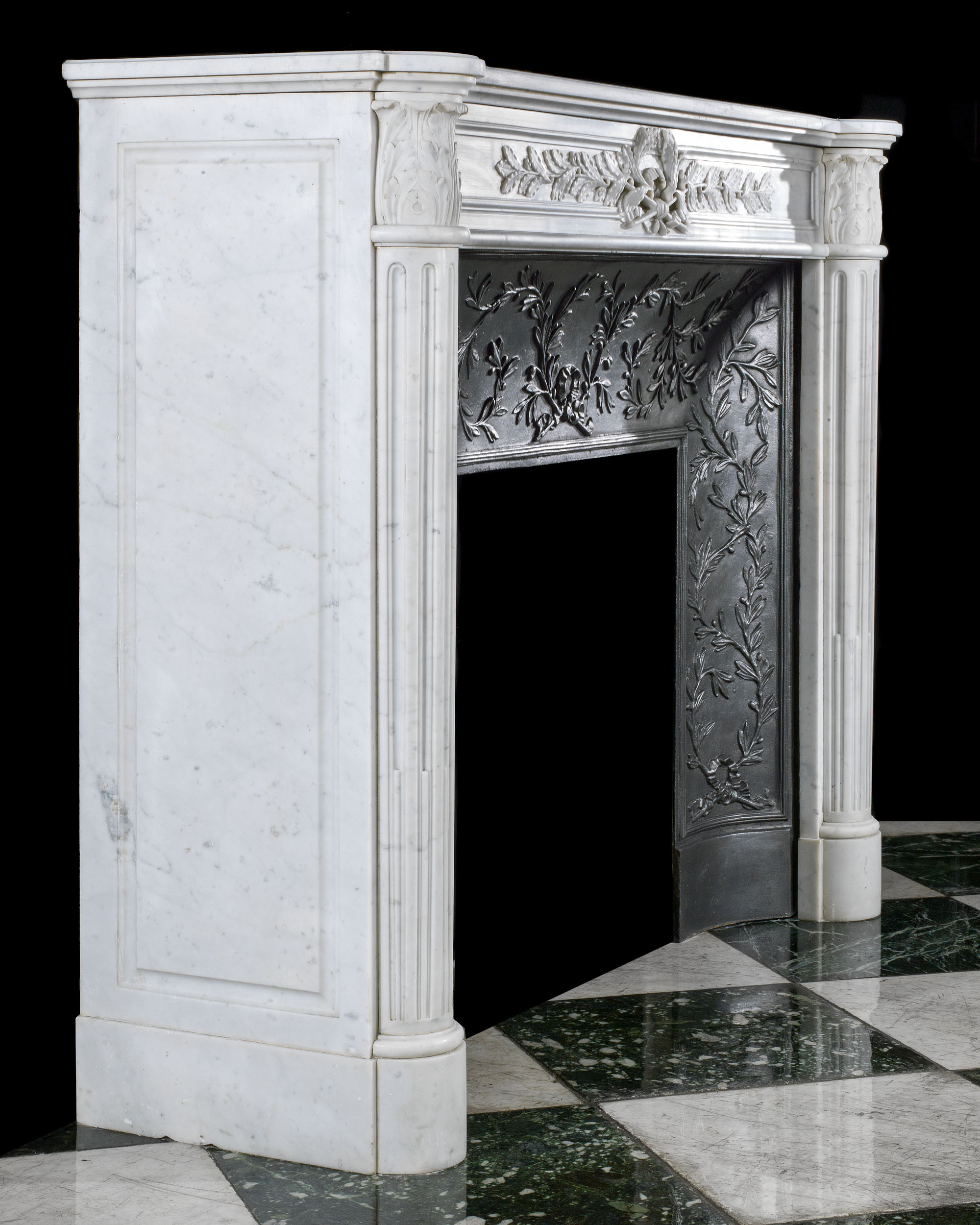 A Louis XVI style Carrara Fireplace