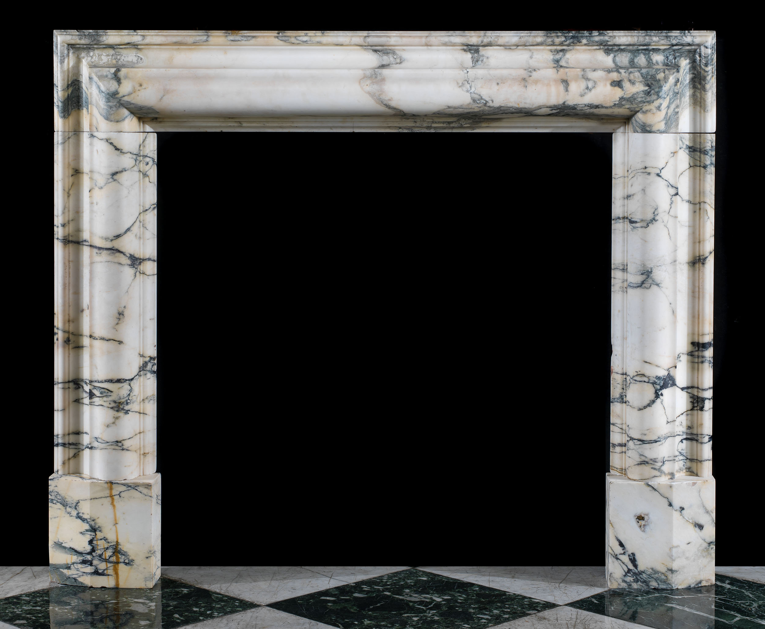 A 20th century Pavonazzo Marble Bolection