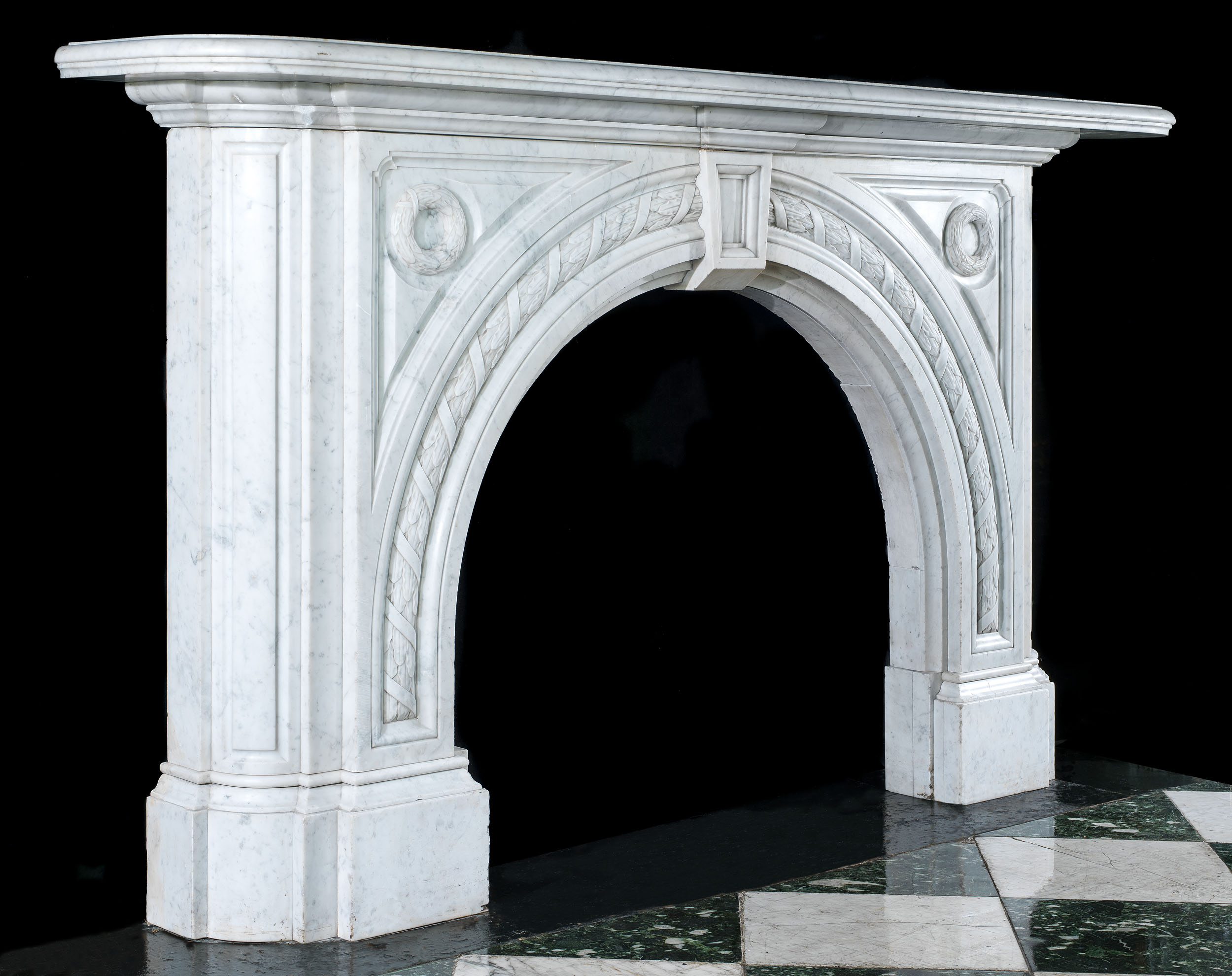 An Arched Carrara Marble Victorian Fireplace