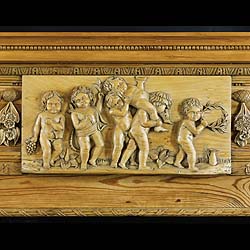 Antique Pine Georgian Chimneypiece with Columned Jambs and Cherubs 
