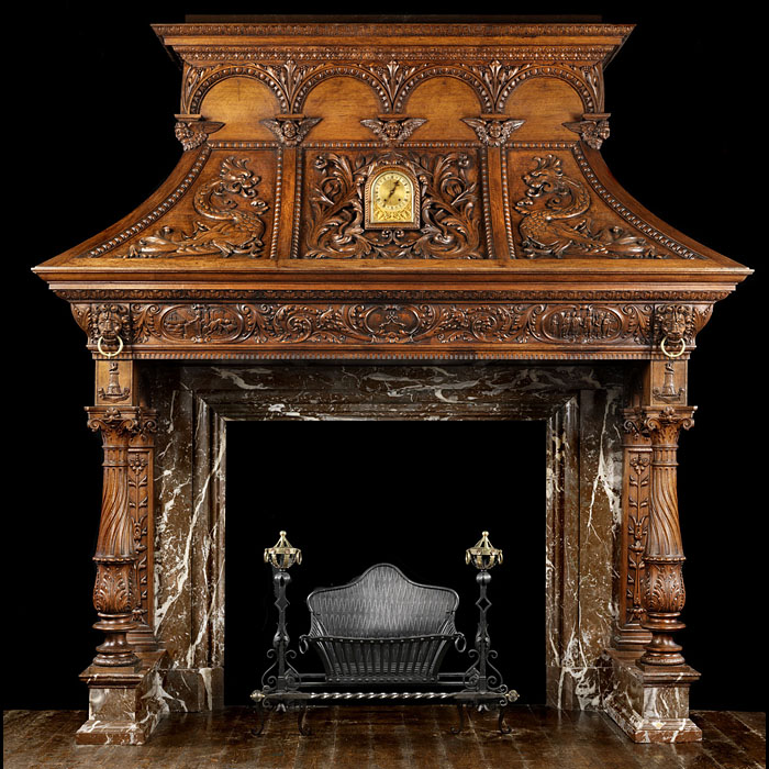  An Italian Renaissance Revival oak fireplace mantel    