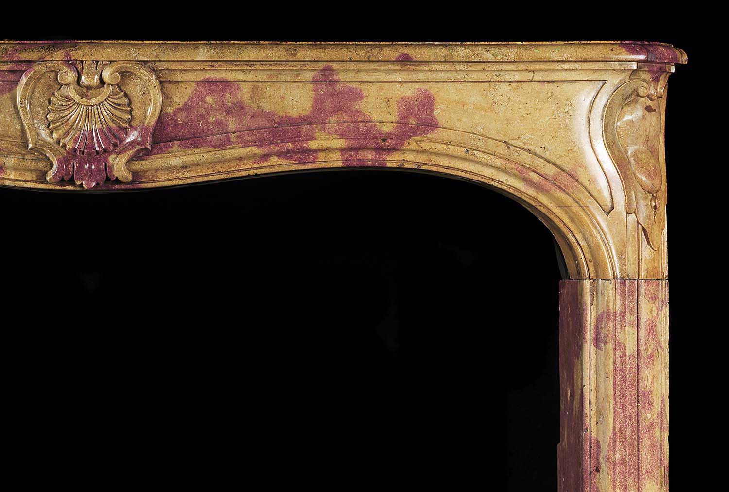 Louis XV Chimneypiece in Burgundy Stone 
