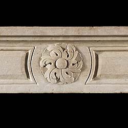 A Louis XVI Wide Limestone Chimneypiece
