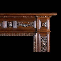 A carved oak antique Jacobean style chimneypiece 