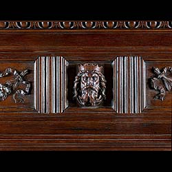 A carved oak antique Jacobean style chimneypiece 