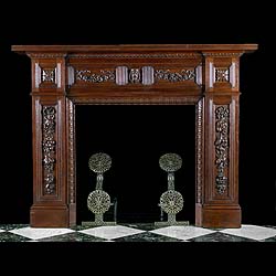 A carved oak antique Jacobean style chimneypiece 