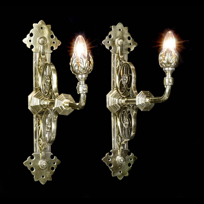 A pair of Antique Pugin style brass wall lights