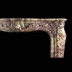 A Rare French Rococo Fior Di Pesco Apuano Marble Fireplace Surround


