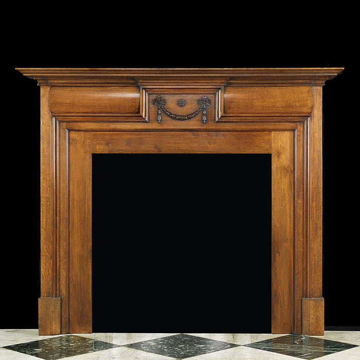 Carved Oak small Victorian fireplace in the George II style


