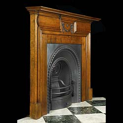 Carved Oak small Victorian fireplace in the George II style


