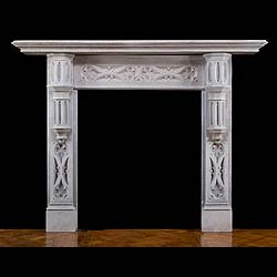 A composition stone Gothic Revival chimneypiece