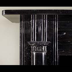 A Kilkenny Black Fossil Marble Fireplace