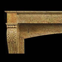 A Louis XVI Style Breccia Dorata Fireplace
