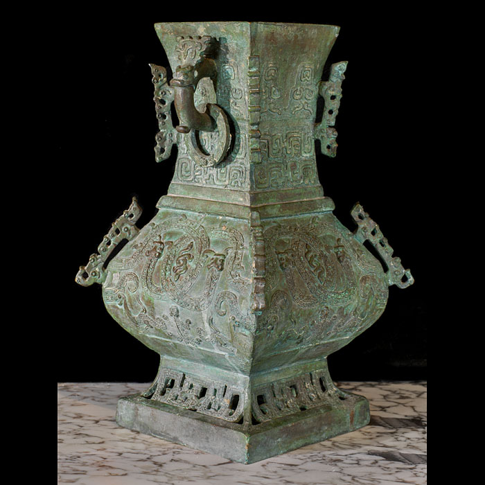 A small Shang Dynasty style bronze vase