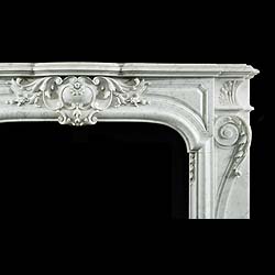 A very fine antique Rococo style Carrara white marble fireplace surround 