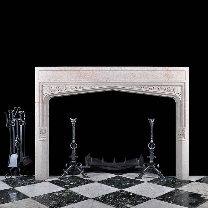 A Tudor Revival style Derbyshire Fossil Limestone Antique Fireplace Surround