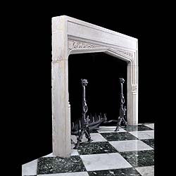 A Tudor Revival style Derbyshire Fossil Limestone Antique Fireplace Surround