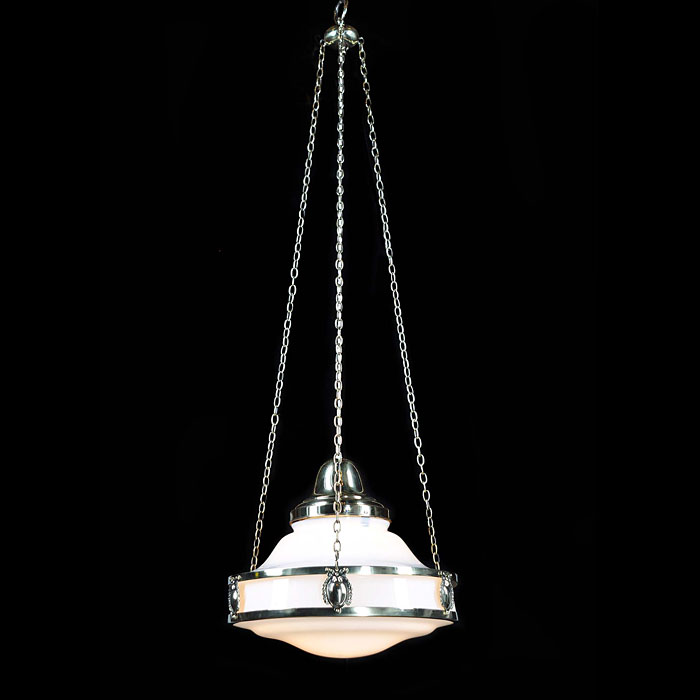 An Art Deco opaque glass and brass chrome ceiling light    