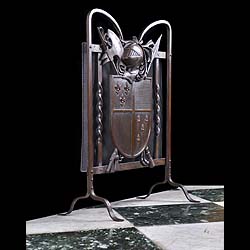 A Bronze & Cast Iron Armorial Fire Guard 