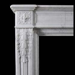 A small Carrara marble Louis XVI style antique chimneypiece