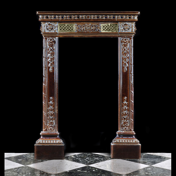 Antique Tall Glazed Terracotta Fire Surround
 A tall dark chocolate glazed terracotta chimneypiece. French late 19th century.
