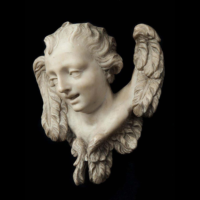 Antique marble sculpture of the head of an angel