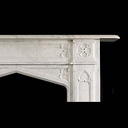 An Antique Gothic Revival Carrara Marble Fireplace Surround