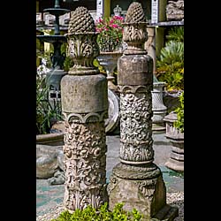  A pair of Pineapple topped antique terracotta pillars  