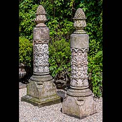  A pair of Pineapple topped antique terracotta pillars  