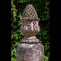  A pair of Pineapple topped antique terracotta pillars  