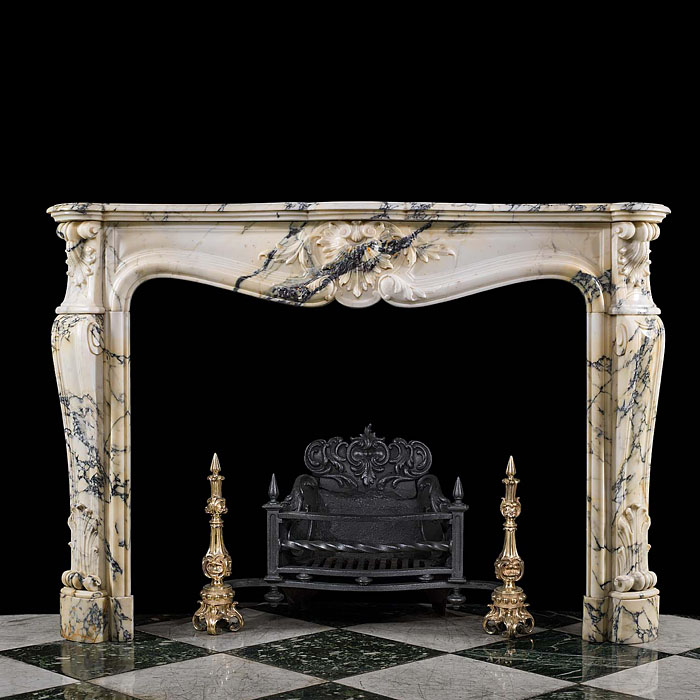 An Antique French Pavonazzetto Bianco Marble fireplace surround
