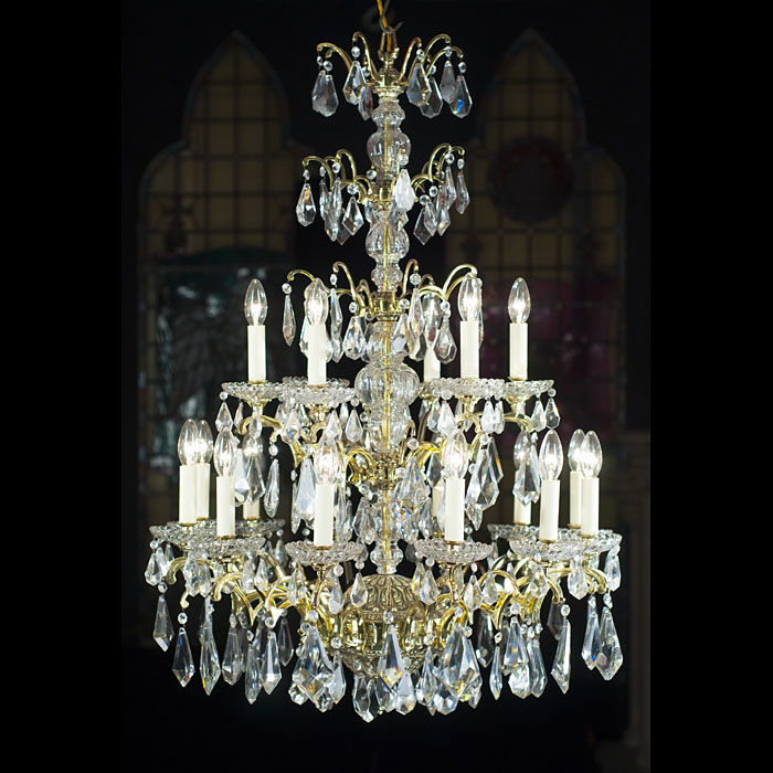 An 18 Branch Crystal & Bronze Chandelier 