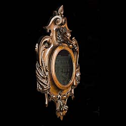 A Cartouche Shaped Mahogany Wall Mirror