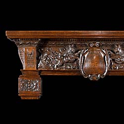 A tall Renaissance style Carved Oak Antique Fireplace Mantel