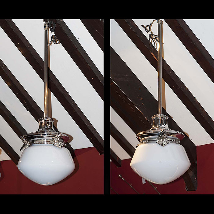 A pair of large Art Deco pendant ceiling lights 