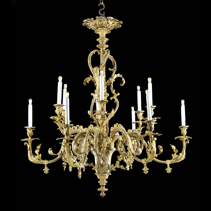 A 19th century antique 12 branch brass Rococo style chandelier