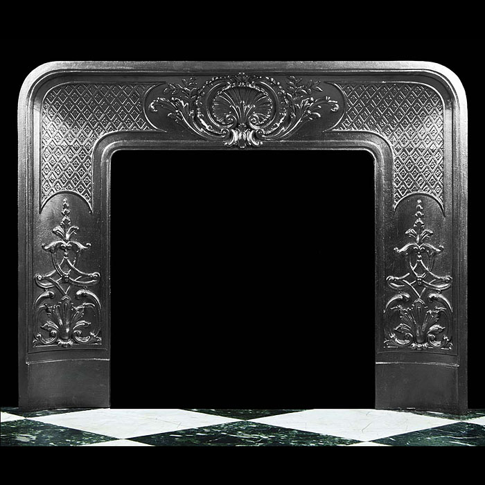  An antique cast iron Louis XVI style fireplace insert