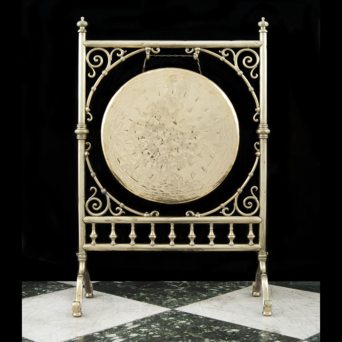 A Victorian brass dinner gong