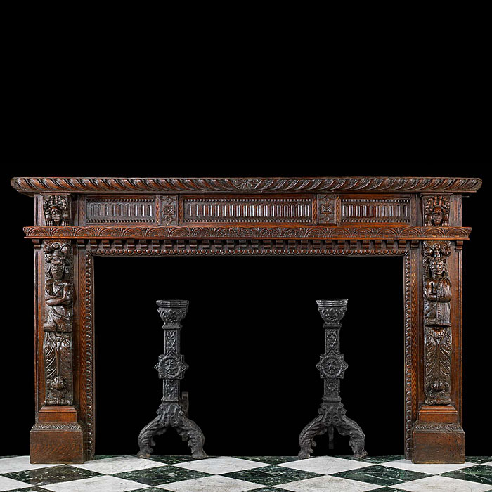 A Wide Carved Oak Jacobean Style Fireplace