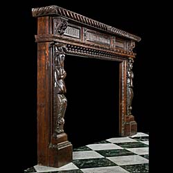 A Wide Carved Oak Jacobean Style Fireplace