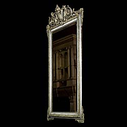 A Tall Silvered Louis XVI Wall Mirror