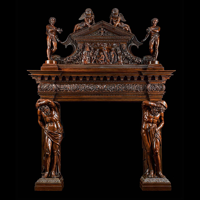 A very imposing Venetian Baroque style Antique walnut Chimneypiece 