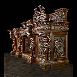 A very imposing Venetian Baroque style Antique walnut Chimneypiece 