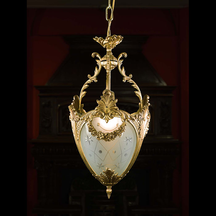 An Ornate Regency Style Brass Ceiling Light