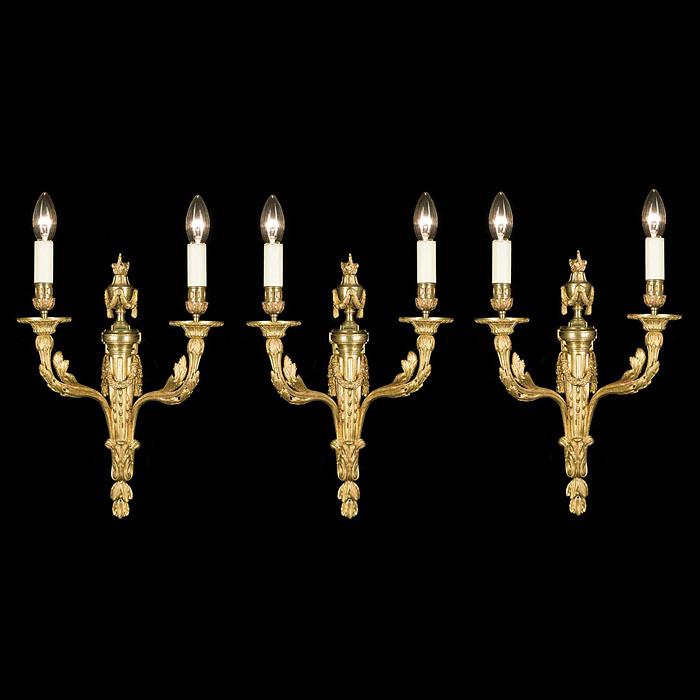 Mid 20th century set of three fine gilt brass wall lights