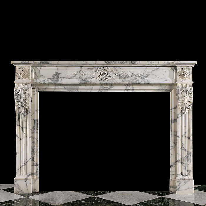 A fireplace surround in the Louis XVI style 