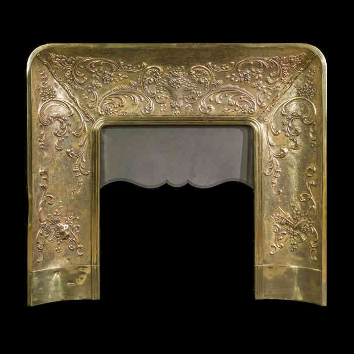 A Louis XIV Style Repousse Brass Insert